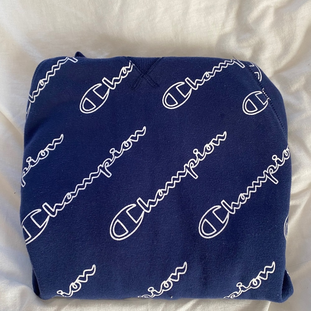 Authentic champion hoodie with repeating CHAMPION